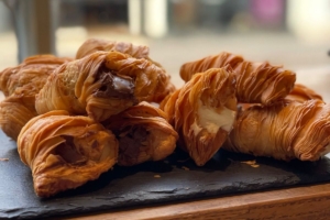 Pastries on a slate platter.