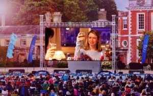 Bridget Jones's Diary showing on a large outdoor screen.