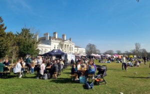 A bustling market taking place outside of Hylands House.