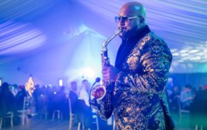 A man playing a saxophone.