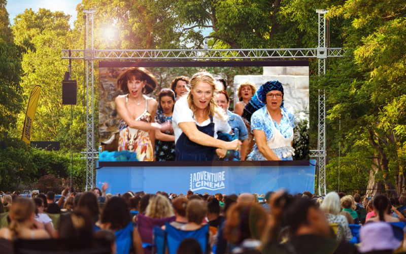 Mamma Mia on a large outdoor screen